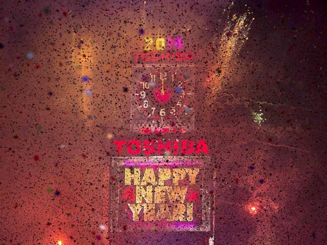 Fireworks go off at midnight on New Year's Eve in Times Square in New York. (Reuters Photo)