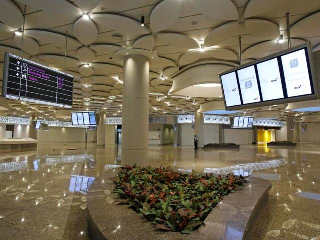 A security personal stands inside newly constructed Terminal 2 at Chhatrapati Shivaji International Airport. REUTERS