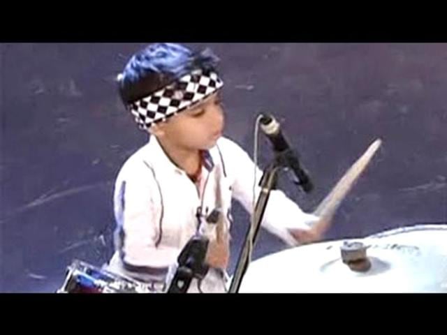 Three-year-old-Anshuman-playing-drums Three-year-old-Anshuman-playing-drums