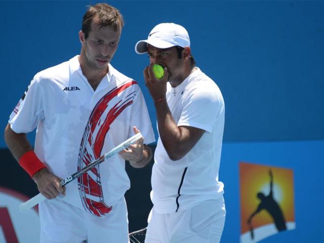 India-s-Leander-Paes-R-and-Czech-Republic-s-Radek-Stepanek-speak-during-their-men-s-doubles-match-against-Czech-Republic-s-Lukas-Rosol-and-Lukas-Dlouhy-AFP-Photo