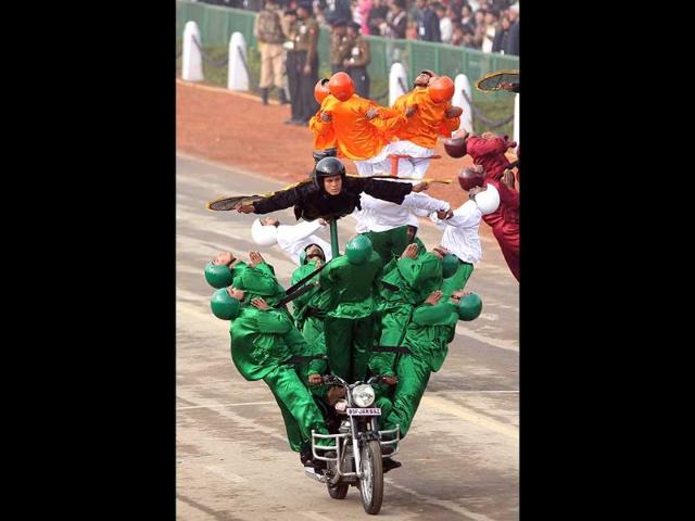 BSF daredevils in action during the full dress rehearsal for the Republic Day parade in New Delhi. (PTI photo)