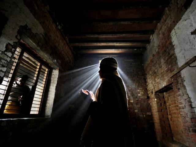 Irshad (13) and Furqaan (16) visiting their looted and burnt house after Muzaffarnagar communal riots. (Raj K Raj/ HT Photo)