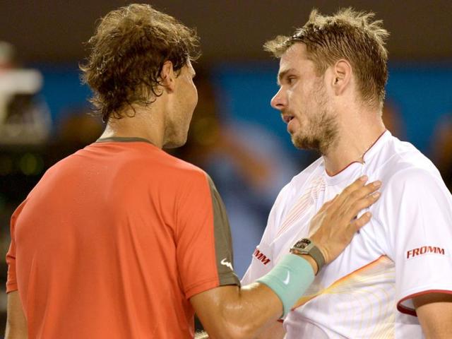 Switzerland's Stanislas Wawrinka (R) embraces Rafael Nadal after winning against him in the mens singles final of the 2014 Australian Open in Melbourne. (AFP Photo) Switzerland's Stanislas Wawrinka (R) embraces Rafael Nadal after winning against him in the mens singles final of the 2014 Australian Open in Melbourne. (AFP Photo)