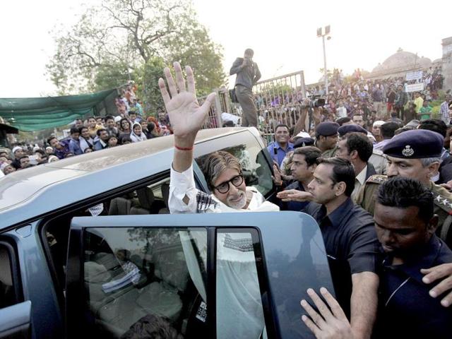 Amitabh Bachchan waves to fans in Ahmedabad. (AP Photo)