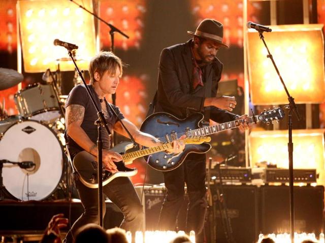 Keith Urban, left, and Gary Clark, Jr. perform Cop Car on stage at the 56th annual Grammy Awards at Staples Centre.