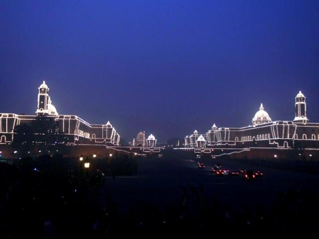 North Block and South Block buildings and the presidential palace are illuminated during the 'Beating the Retreat' ceremony in New Delhi on Wednesday. The ceremony symbolises retreat after a day on the battlefield, and marks the official end of the Republic Day celebrations. Ajay Aggarwal/HT Photo