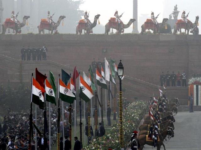 Mounted Border Security Force personnel stand guard on their camels as marching bands from the Indian Army, Navy and Air Force march during the 'Beating the Retreat' ceremony in New Delhi on Wednesday. The ceremony is a culmination of Republic Day celebrations. Virendra Singh Gosain/HT Photo