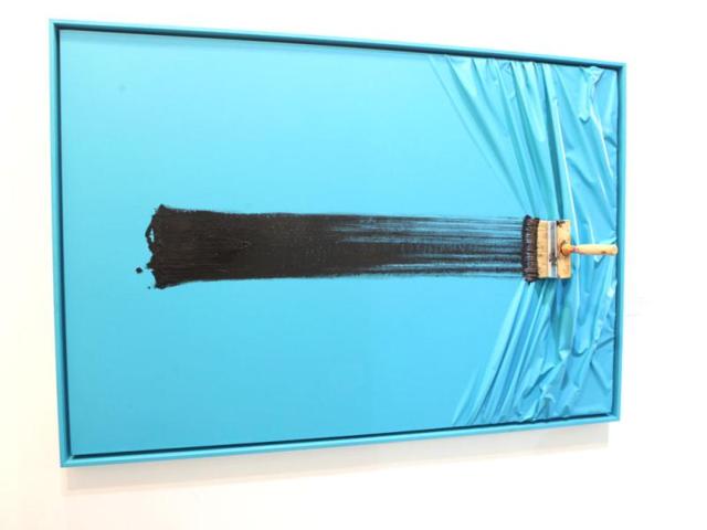 French artist Donadini has very interesting mix media works at the fair. This is a wrinkled canvas with a real static brush.