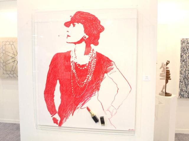 French artist Donadini has made a portrait of Coco Chanel with red lipstick.