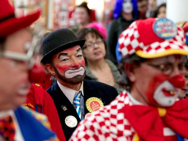 Clowns dressed in full costume attend a Service in memory of celebrated clown Joseph Grimaldi at a church in Dalston, East London. The annual service, attended by clowns, is held in memory of the original 'Clown Joey' Joseph Grimaldi, who died in 1837. (AFP photo)