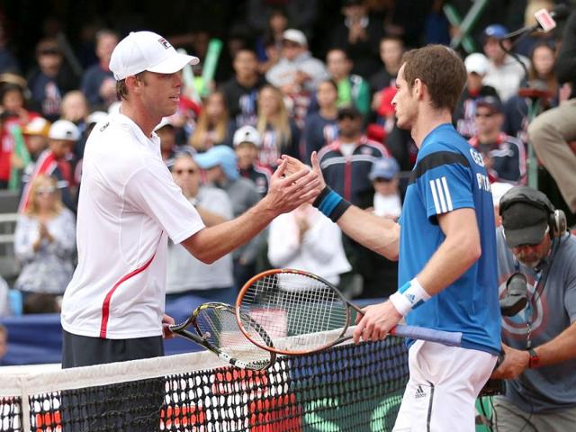 Andy Murray of Great Britain shakes hands at the net after his four set victory against Sam Querrey of the United States during day three of the Davis Cup World Group first round in San Diego. (AFP Photo)