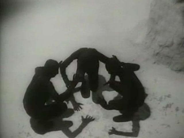The first sequence of the epic film Jukti Tokko aar Goppo.