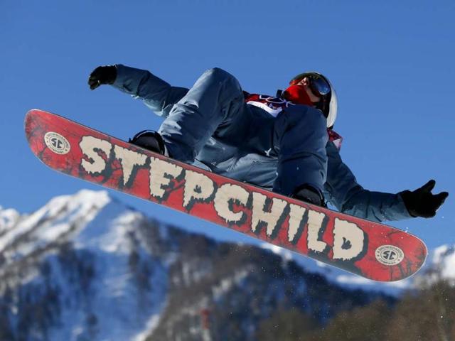 Russia's Alexey Sobolev takes a jump during men's snowboard slopestyle qualifying at the Rosa Khutor Extreme Park ahead of the 2014 Winter Olympics in Krasnaya Polyana, Russia. (AP photo) 