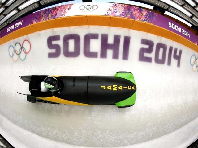 Jamaica's two-man bobsleigh pilot Winston Watts speeds down the track during an unofficial progressive training at the Sanki sliding center in Rosa Khutor, a venue for the Sochi 2014 Winter Olympics near Sochi.(Reuters photo) 
