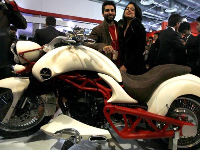 Actress Sameera Reddy poing with a concept bike by Vardenchi Motorcycles at the 12th Auto Expo in Greater Noida. (Raj K Raj/Hindustan Times)