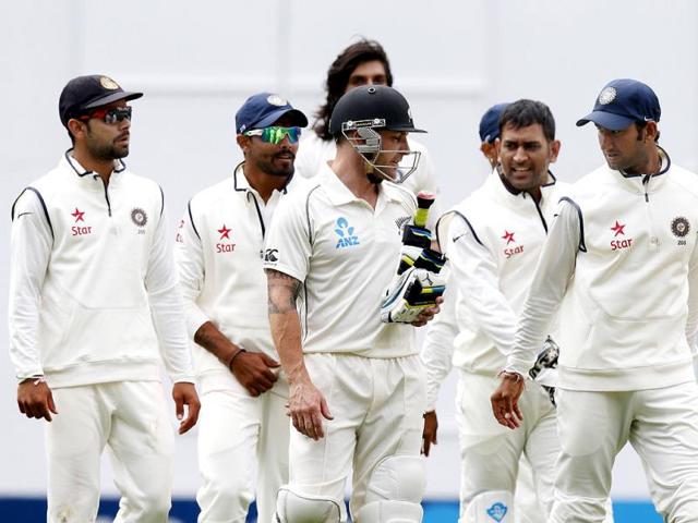 New Zealand's Brendon McCullum (C) is congratulated by some players of the Indian team after scoring 224 runs on day two of the first Test against India at Eden Park in Auckland. (Reuters Photo)
