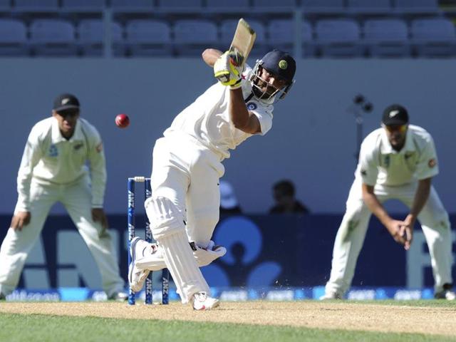 Ravindra Jadeja hits out to be caught by New Zealand’s Ish Sodhi for 26 on the fourth day of the first Test at Eden Park in Auckland. (AP Photo)