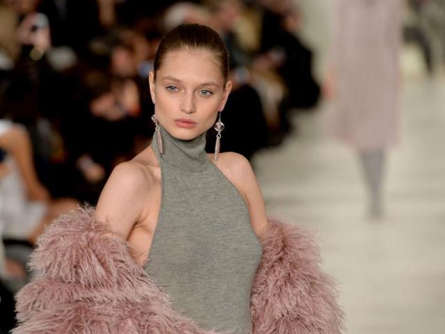 A model presents designs by Ralph Lauren during the Mercedes-Benz Fashion Week Fall/Winter 2014 in New York. (AFP) A model presents designs by Ralph Lauren during the Mercedes-Benz Fashion Week Fall/Winter 2014 in New York. (AFP)