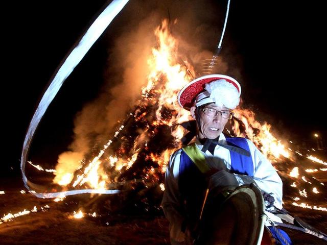 A resident wearing a traditional costume performs to celebrate the first full moon of the Lunar New Year, in Yongin, South Korea (AP photo) A resident wearing a traditional costume performs to celebrate the first full moon of the Lunar New Year, in Yongin, South Korea (AP photo)