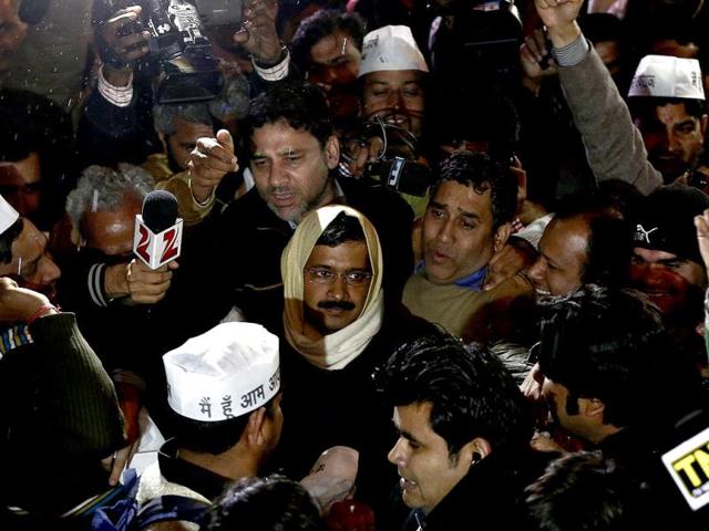Aam Aadmi Party (AAP) chief Arvind Kejriwal arrives at the party headquarters in New Delhi to address his supporters on February 14, 2014. (Reuters photo)
