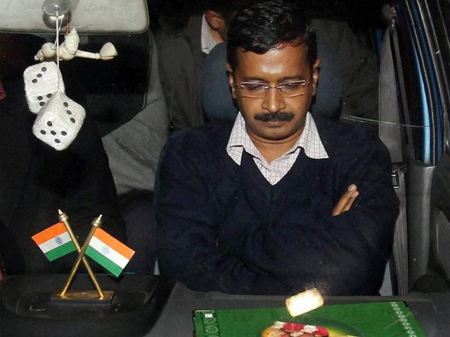 Delhi chief minister Arvind Kejriwal leaves after attending a special session in the Delhi Assembly on February 14, 2014. (PTI photo)