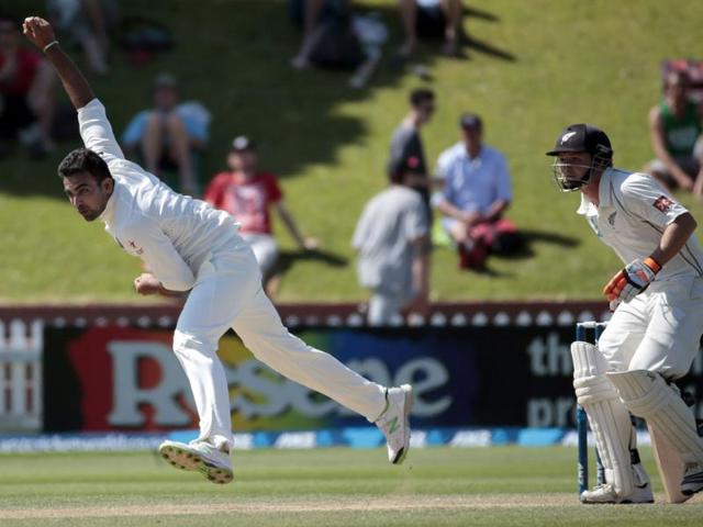 Zaheer Khan (L) bowls in the New Zealand second innings on day four of the second Test at the Basin Reserve in Wellington. (Reuters Photo)