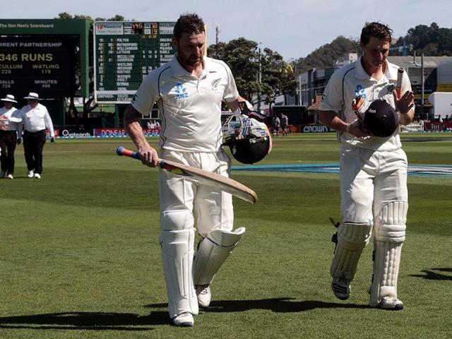 New Zealand's Brendon McCullum and BJ Watling (R) leave the pitch for tea with a record partnership in the second innings on day four of the second Test against India at the Basin Reserve in Wellington. (Reuters Photo)