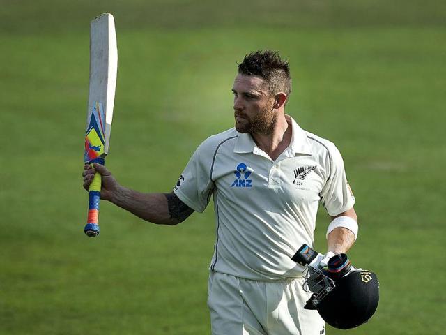 New Zealand's Brendon McCullum acknowledges fans as he walks from the field at the end of the day's play on Day 4 of the 2nd Test against India at the Basin Reserve in Wellington. (AFP Photo)