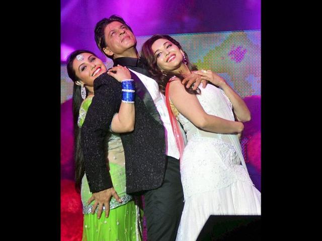 Shah Rukh Khan, Rani Mukherji, and Madhuri Dixit Nene perform during an event,Temptation Reloaded 2014 in Kuala Lumpur. (PTI Photo)