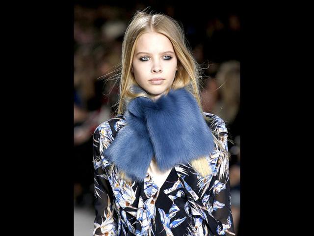 A model presents a creation from the Topshop Unique collection during the 2014 Autumn/ Winter London Fashion Week in London. (AFP)