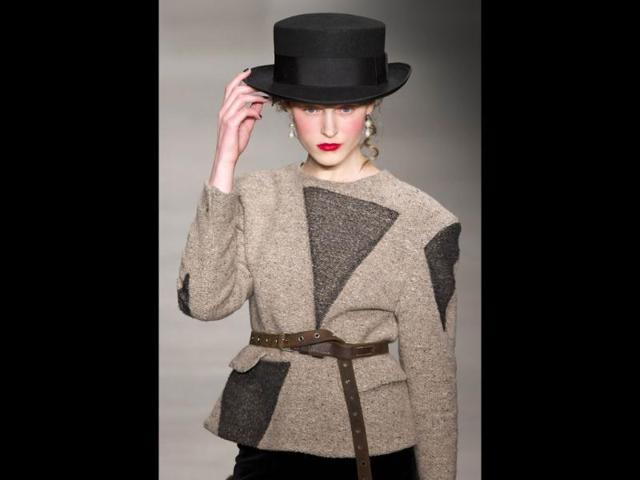 A model presents a creation from Vivienne Westwood Red Label during the 2014 Autumn/ Winter London Fashion Week in London. (AFP)