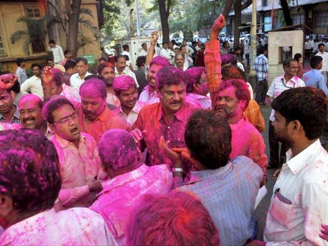 Pro-Telangana activists celebrate the passage of Telangana bill in the Lok Sabha in Hyderabad. (PTI photo)