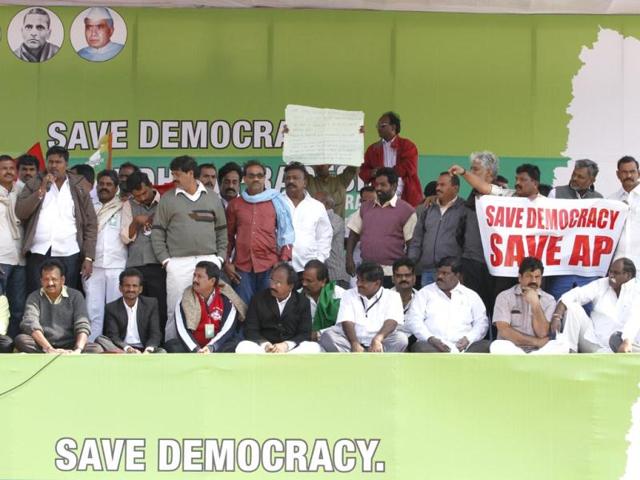Supporters of united Andhra Pradesh hold a Dharna at Ramlila Ground in New Delhi after the passage of Telangana bill in the Lok Sabha. (HT photo/Arun Sharma)