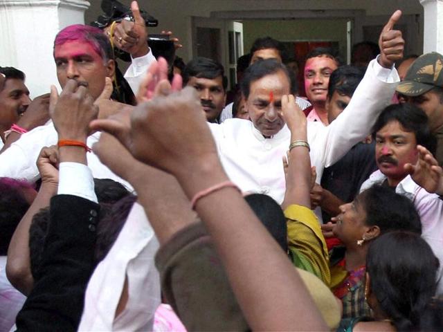 TRS chief K Chandrasekhar Rao with supporters celebrating the passage of Telangana bill in the Lok Sabha, at his residence in New Delhi. (PTI photo)