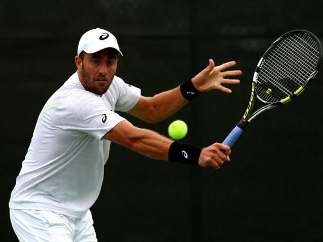 Steve-Johnson-of-the-USA-returns-a-shot-AFP-Photo