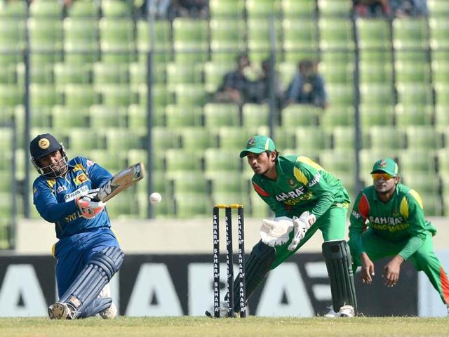 Sri Lankan batsman Ashan Priyanjan (L) plays a shot as Bangladesh wicketkeeper Anamul Haque (C) and Shakib Al Hasan (R) look on during the second ODI at the Sher-e-Bangla National Cricket Stadium in Dhaka. (AFP Photo) Sri Lankan batsman Ashan Priyanjan (L) plays a shot as Bangladesh wicketkeeper Anamul Haque (C) and Shakib Al Hasan (R) look on during the second ODI at the Sher-e-Bangla National Cricket Stadium in Dhaka. (AFP Photo)