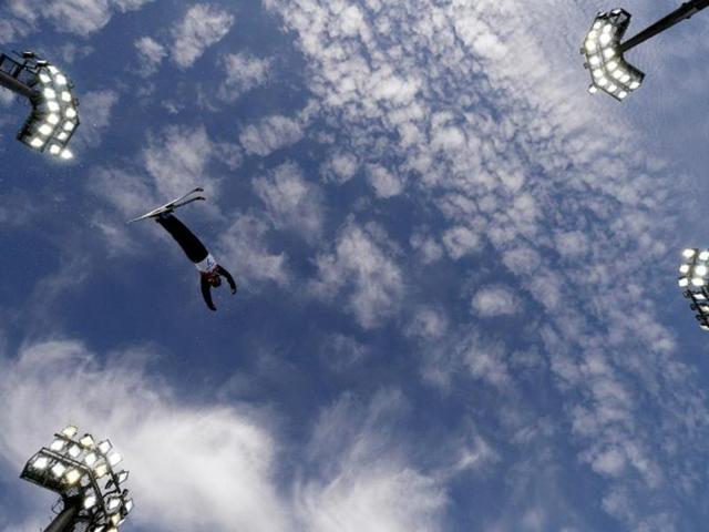 US Emily Cook takes a warm-up run before the start of the Women's Freestyle Skiing Aerials Qualifications at the Rosa Khutor Extreme Park during the Sochi Winter Olympics. AFP