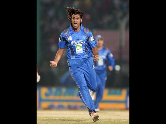 Afghan bowler Shapoor Zadran celebrates after taking the wicket of Bangladeshi batsman Shamsur Rahman during the fifth match of the Asia Cup at the Khan Shaheb Osman Ali Stadium in Fatullah. (AFP Photo) Afghan bowler Shapoor Zadran celebrates after taking the wicket of Bangladeshi batsman Shamsur Rahman during the fifth match of the Asia Cup at the Khan Shaheb Osman Ali Stadium in Fatullah. (AFP Photo)