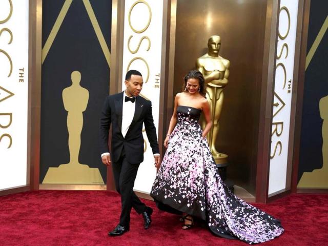 Singer John Legend and model Chrissy Teigen arrive at the 86th Academy Awards in Hollywood, California March 2, 2014. (Reuters Photo)