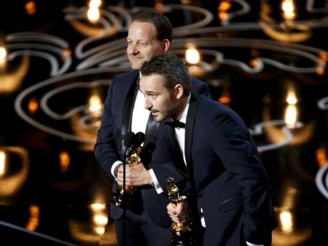 Kim Magnusson and Anders Walter accept the Oscar for best live action short film for Helium.