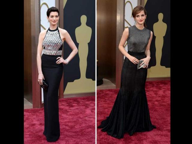 Oscar presenter Anne Hathaway displays toned back in black Gucci halter gown featuring dazzling disco bodice (left). Emma Watson seemed to float over the red carpet at the awards in a lovely Vera Wang dress and Jimmy Choo heels. (AFP) Oscar presenter Anne Hathaway displays toned back in black Gucci halter gown featuring dazzling disco bodice (left). Emma Watson seemed to float over the red carpet at the awards in a lovely Vera Wang dress and Jimmy Choo heels. (AFP)