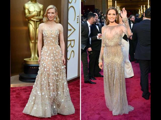 Cate Blanchett wore an Armani Prive sleeveless nude gown featuring Swarovski crystals (left), and Academy Award presenter Angelina Jolie arrived at the Oscars red carpet in a silver embroidered Elie Saab haute couture dress that daringly showed her breasts. (AFP) Cate Blanchett wore an Armani Prive sleeveless nude gown featuring Swarovski crystals (left), and Academy Award presenter Angelina Jolie arrived at the Oscars red carpet in a silver embroidered Elie Saab haute couture dress that daringly showed her breasts. (AFP)