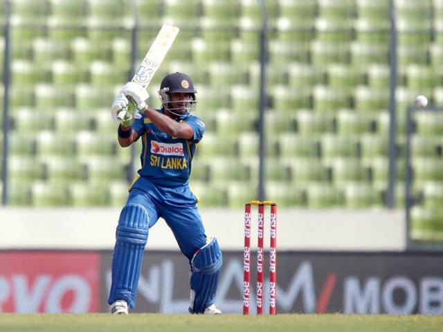 Sri Lankan batsman Kusal Perera plays a shot during the seventh match of the Asia Cup against Afghanistan at the Sher-e-Bangla National Cricket Stadium in Mirpur. (AFP Photo)