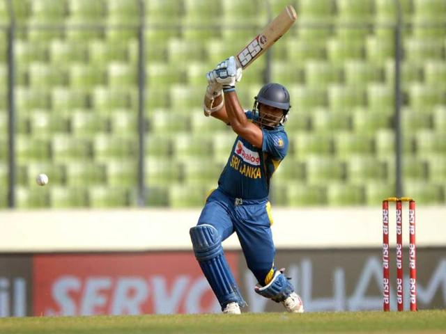 Sri Lankan batsman Kumar Sangakkara plays a shot during the seventh match of the Asia Cup against Afghanistan at the Sher-e-Bangla National Cricket Stadium in Mirpur. (AFP Photo)
