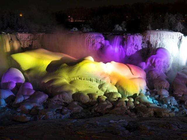 A partially frozen Niagara Falls is seen on the American side lit by lights during sub freezing temperatures. (Reuters Photo) A partially frozen Niagara Falls is seen on the American side lit by lights during sub freezing temperatures. (Reuters Photo)