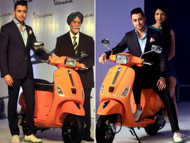 Imran Khan with Ravi Chopra, CMD Piaggio Vehicles during the launch on Wednesday. (PTI Photo)
