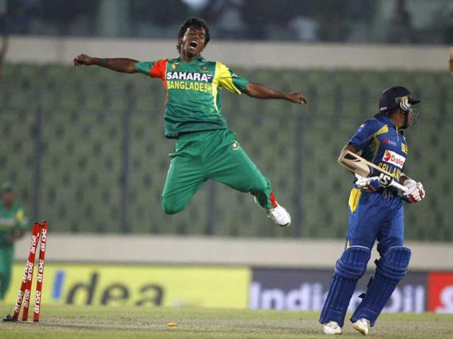 Bangladesh’s Rubel Hossain jumps as he celebrates the wicket of Sri Lanka’s Mahela Jayawardene during their Asia Cup match in Mirpur. (AP Photo)