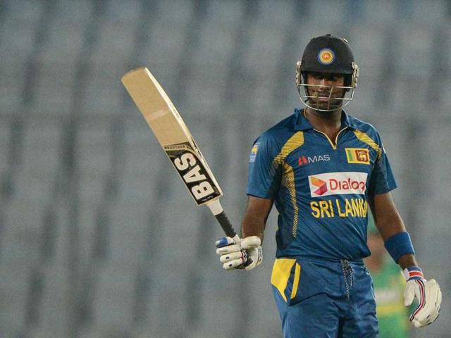 Sri Lankan cricket captain Angelo Mathews reacts after scoring a half century (50 runs) during the tenth match of the Asia Cup against Bangladesh at the Sher-e-Bangla National Cricket Stadium in Mirpur. (AFP Photo)