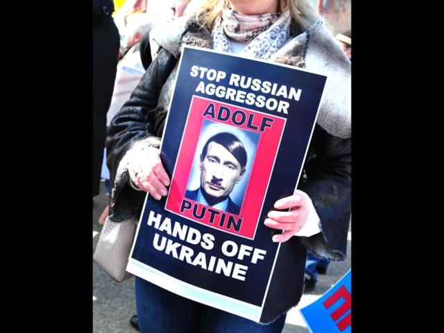 Demonstrators-with-placards-protest-against-Russian-agression-in-the-Ukraine-in-front-of-the-White-House-in-Washington-DC-AFP-photo Demonstrators-with-placards-protest-against-Russian-agression-in-the-Ukraine-in-front-of-the-White-House-in-Washington-DC-AFP-photo
