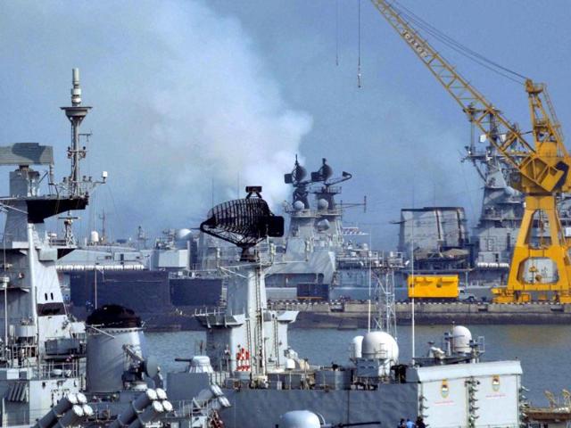 Smoke billowing out after a fire broke on INS Calcutta at the Naval Dockyard in Mumbai. (PTI photo)